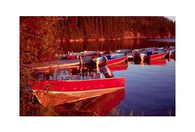 red boats lake dock sunset sunrise tree line